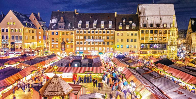 Stalls of Nuremberg’s Christmas Market lit up at night